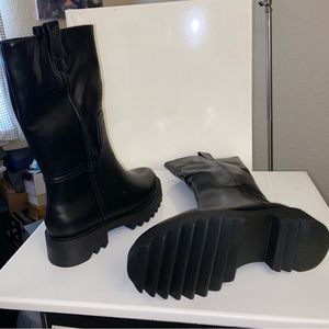 NWT in box. Womens black boots. Size 7.5